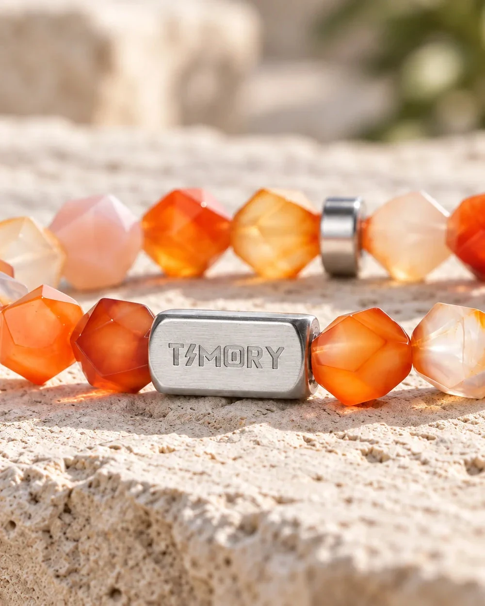 Close detail of natural agate facets and a personal metal detail